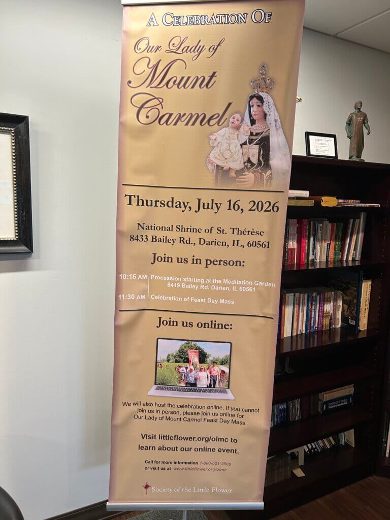 Vertical banner announcing 'A Celebration Of Our Lady of Mount Carmel' with image of Mary holding a child, plus event date and location details (July 16, 2026).